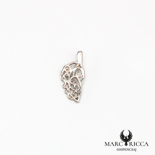 Pendentif corse avec des volutes en argent ou vermeil