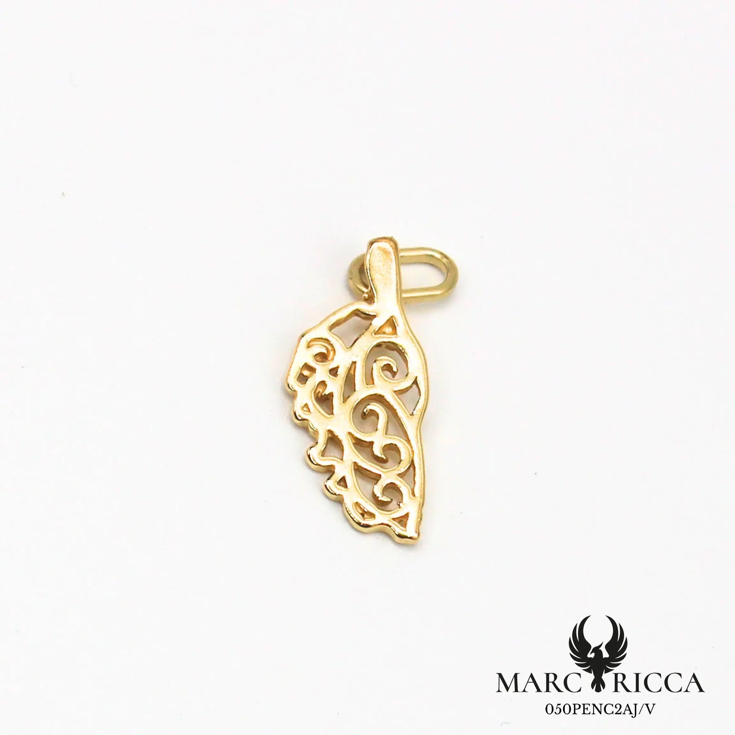 Pendentif corse avec des volutes en argent ou vermeil