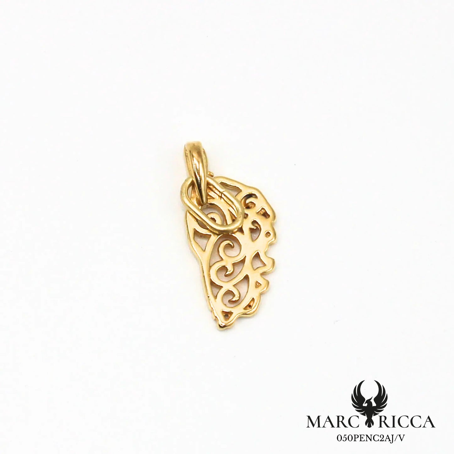 Pendentif corse avec des volutes en argent ou vermeil