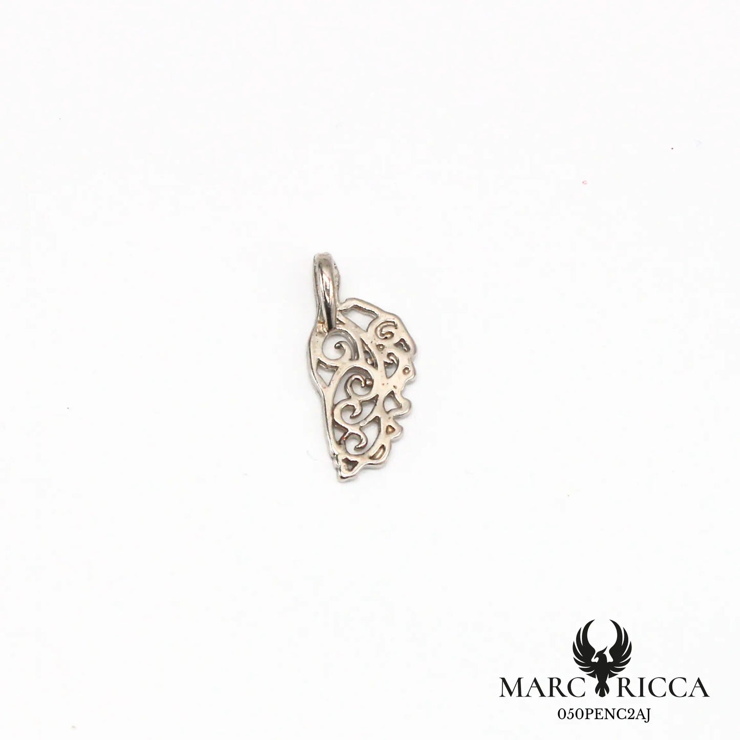 Pendentif corse avec des volutes en argent ou vermeil